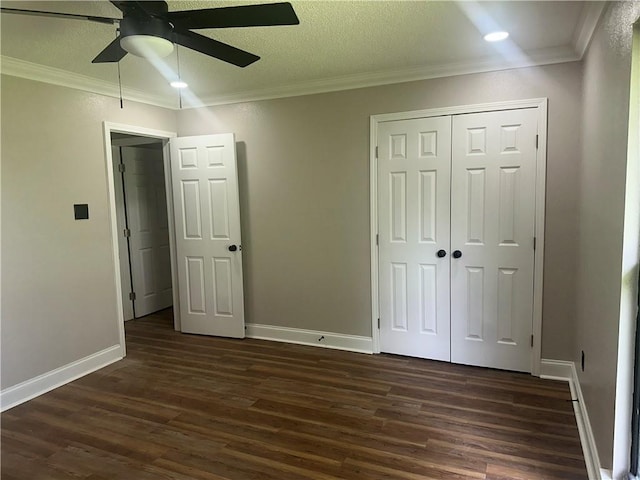 2012 S Sugar Ridge Rd, La Place, LA 70068 - unfurnished bedroom with dark wood-type flooring, crown molding, a closet, and ceiling fan