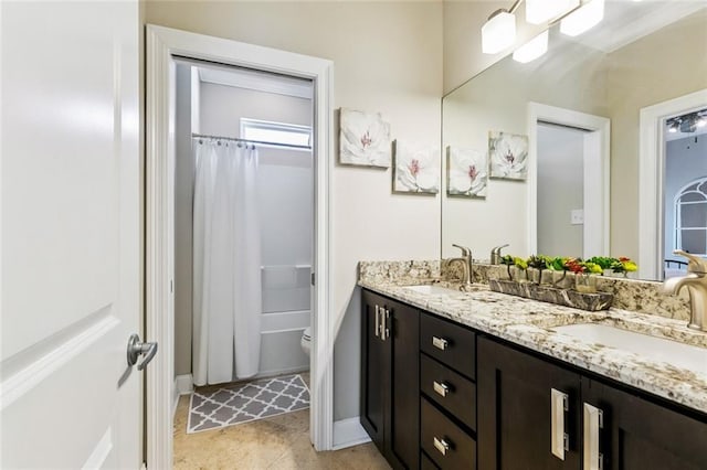 931 French St, New Orleans, LA 70124 - bathroom featuring double vanity and shower / bathtub combination with curtain