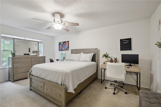 1125 Lori Dr, Slidell, LA 70461 - bedroom with light colored carpet, multiple windows, a ceiling fan, and a textured ceiling