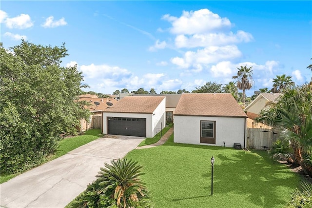 425 Eden Isles Blvd, Slidell, LA 70458 - view of front of home with stucco siding and a detached garage
