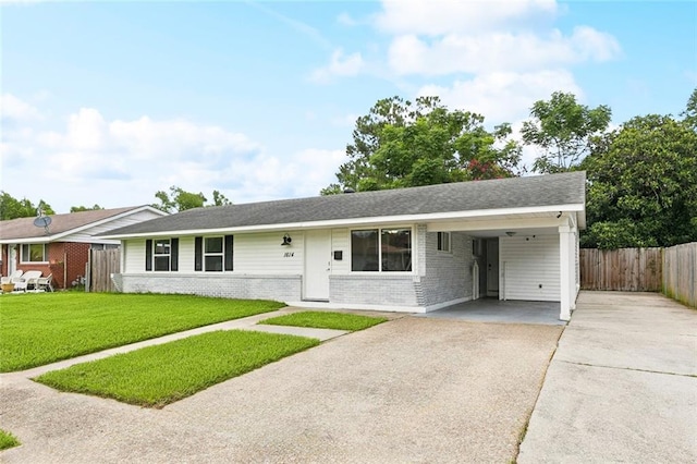 1614 River Oaks Dr, New Orleans, LA 70131 - single story home with driveway, brick siding, and an attached carport