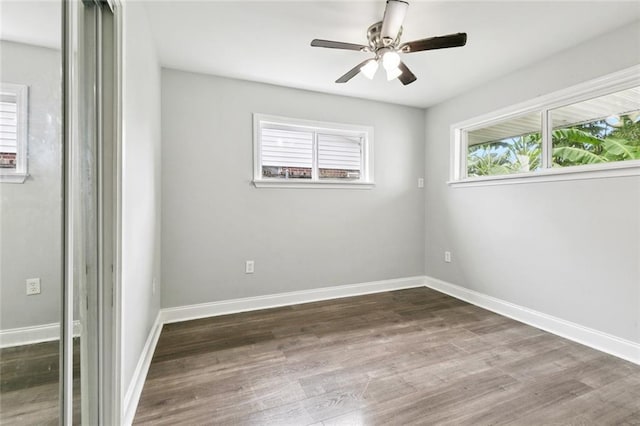 1614 River Oaks Dr, New Orleans, LA 70131 - unfurnished bedroom with wood finished floors and ceiling fan