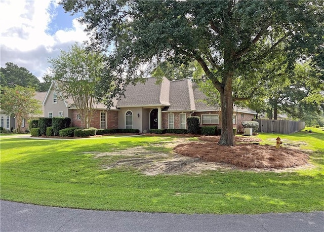 207 Hidden Springs Ln, Covington, LA 70433 - view of front facade featuring brick siding