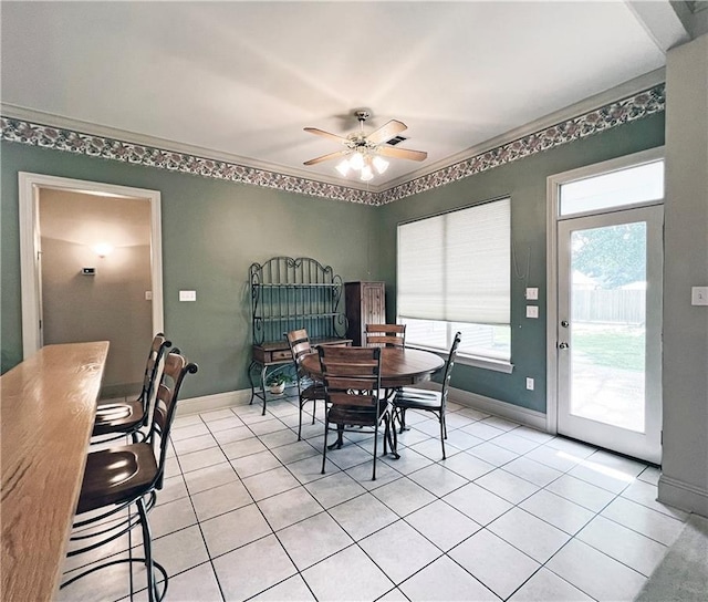 207 Hidden Springs Ln, Covington, LA 70433 - dining room featuring ceiling fan, light tile patterned floors, and healthy amount of natural light