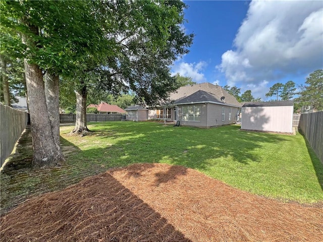 207 Hidden Springs Ln, Covington, LA 70433 - fenced backyard featuring a shed