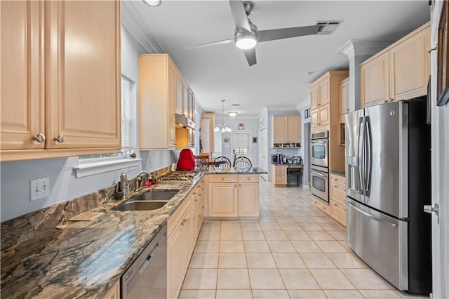1 Platt St, Kenner, LA 70065 - kitchen with stainless steel appliances, a peninsula, light brown cabinets, light tile patterned floors, and a ceiling fan