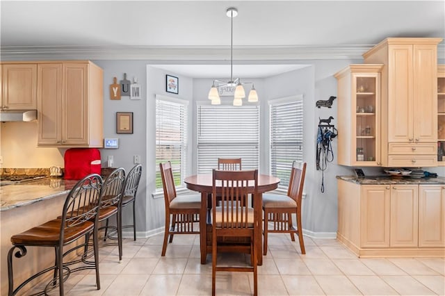 1 Platt St, Kenner, LA 70065 - dining room with light tile patterned flooring, crown molding, and a chandelier