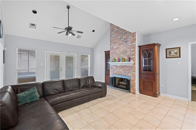 1 Platt St, Kenner, LA 70065 - living area featuring a ceiling fan, light tile patterned floors, a brick fireplace, high vaulted ceiling, and french doors