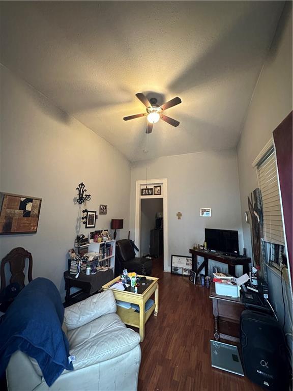 2620-22 Philip St, New Orleans, LA 70113 - living room featuring ceiling fan, wood finished floors, and an office area