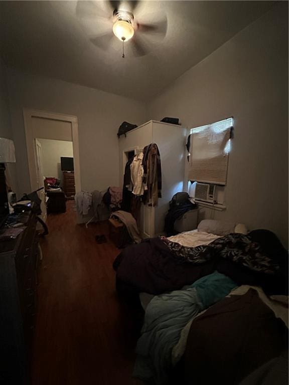 2620-22 Philip St, New Orleans, LA 70113 - bedroom with cooling unit, a ceiling fan, and wood finished floors