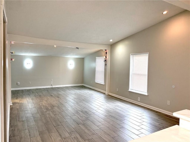 2128 Dupont Dr, Gretna, LA 70056 - unfurnished room featuring dark wood-style flooring and recessed lighting