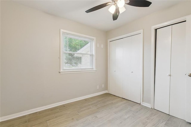 2128 Dupont Dr, Gretna, LA 70056 - unfurnished bedroom with light wood-style flooring and a ceiling fan