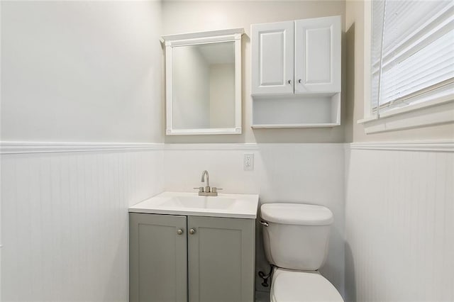 2128 Dupont Dr, Gretna, LA 70056 - bathroom featuring wainscoting and vanity
