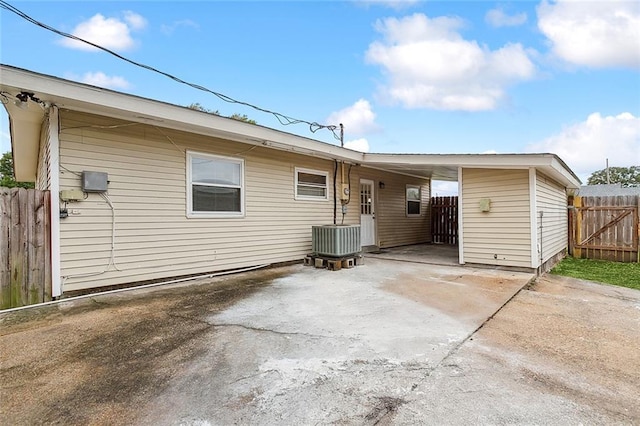 2128 Dupont Dr, Gretna, LA 70056 - back of house featuring an attached carport