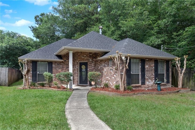 2523 Robin St, Slidell, LA 70460 - view of front of home with a shingled roof and brick siding