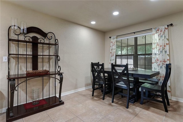 2523 Robin St, Slidell, LA 70460 - dining room featuring a textured wall, recessed lighting, and tile patterned flooring
