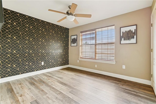 6900 Curran Blvd, New Orleans, LA 70126 - unfurnished room with ceiling fan and hardwood / wood-style flooring