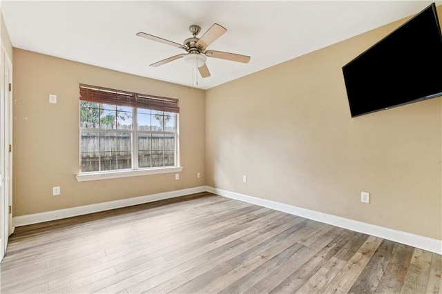 6900 Curran Blvd, New Orleans, LA 70126 - spare room featuring wood finished floors and a ceiling fan
