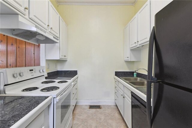 922 Lafayette St, Gretna, LA 70053 - kitchen with black appliances, white cabinets, under cabinet range hood, and dark countertops
