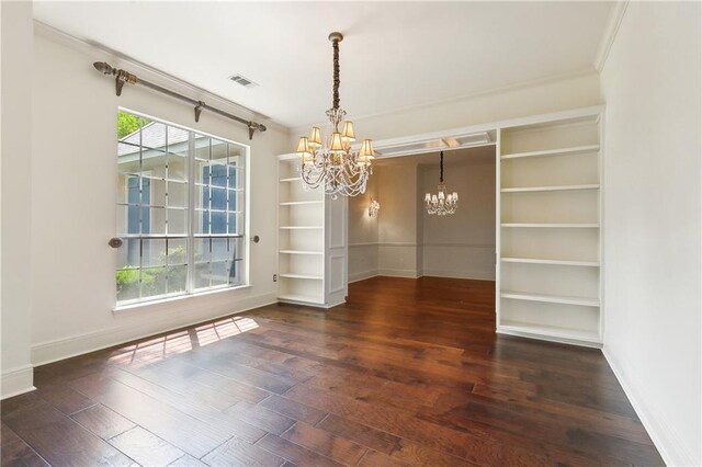 104 Acadian Ln, Mandeville, LA 70471 - empty room with a chandelier, hardwood / wood-style floors, and crown molding