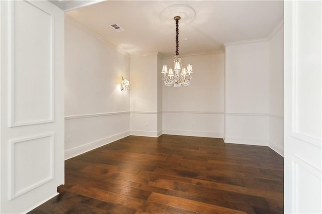 104 Acadian Ln, Mandeville, LA 70471 - unfurnished room with ornamental molding, hardwood / wood-style flooring, and a chandelier