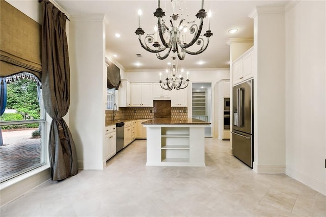 104 Acadian Ln, Mandeville, LA 70471 - kitchen with a chandelier, appliances with stainless steel finishes, dark countertops, open shelves, and decorative backsplash