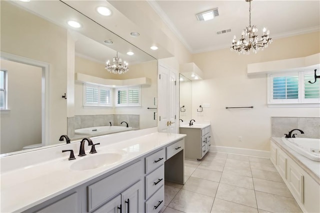 104 Acadian Ln, Mandeville, LA 70471 - bathroom with a chandelier, two vanities, crown molding, a bath, and tile patterned flooring