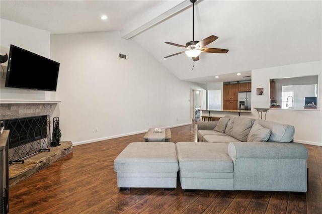 124 Brentwood Dr, Belle Chasse, LA 70037 - living area with ceiling fan, dark wood finished floors, a fireplace with raised hearth, and recessed lighting