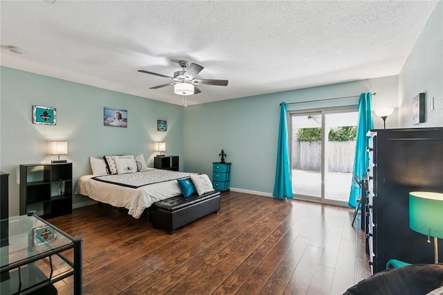 124 Brentwood Dr, Belle Chasse, LA 70037 - bedroom featuring access to outside, a textured ceiling, wood finished floors, and ceiling fan