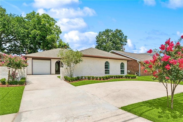 1424 Pecan Ave, Metairie, LA 70001 - ranch-style home with driveway, an attached garage, a front yard, and stucco siding