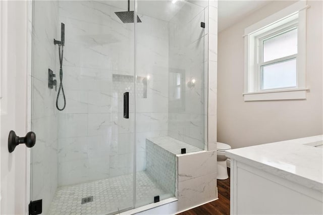 1424 Pecan Ave, Metairie, LA 70001 - bathroom with vanity, a marble finish shower, and wood finished floors
