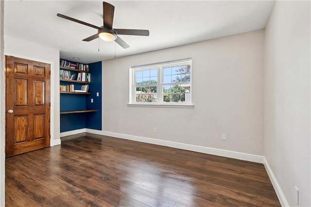 1424 Pecan Ave, Metairie, LA 70001 - spare room with ceiling fan, wood finished floors, and built in study area