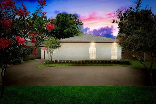 1424 Pecan Ave, Metairie, LA 70001 - view of home's exterior featuring concrete driveway, a yard, and roof with shingles
