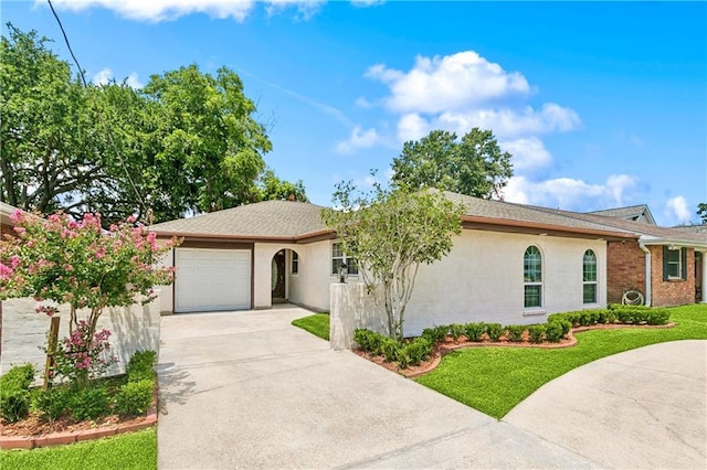 1424 Pecan Ave, Metairie, LA 70001 - ranch-style house with driveway, a garage, a front lawn, and stucco siding