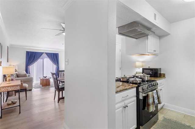 3805 Houma Blvd Unit A243, Metairie, LA 70006 - kitchen featuring stainless steel electric range, range hood, light stone counters, white cabinetry, and open floor plan