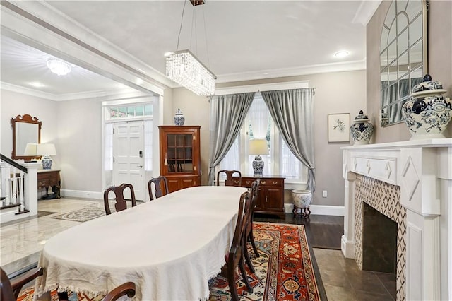5024 S Claiborne Ave, New Orleans, LA 70125 - dining room featuring ornamental molding, a fireplace, stairway, and recessed lighting