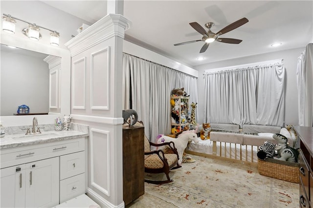 5024 S Claiborne Ave, New Orleans, LA 70125 - ensuite bathroom featuring vanity and ceiling fan