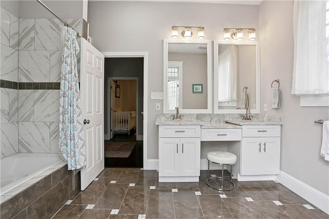 5024 S Claiborne Ave, New Orleans, LA 70125 - full bath with vanity and baseboards