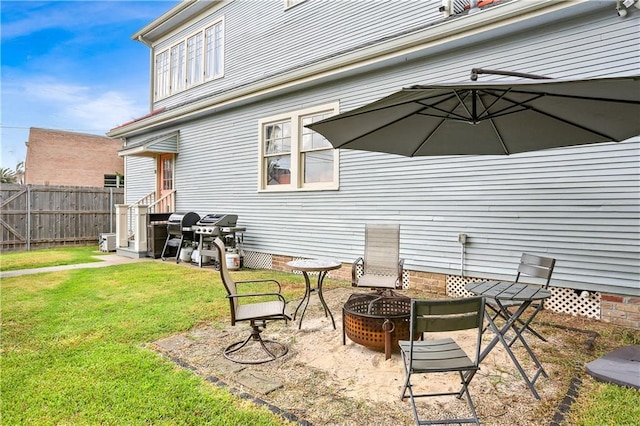5024 S Claiborne Ave, New Orleans, LA 70125 - view of patio / terrace with a grill and a fire pit