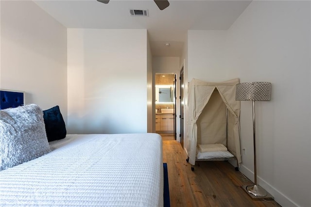 424 S Lopez St, New Orleans, LA 70119 - bedroom featuring hardwood / wood-style floors, ceiling fan, and ensuite bathroom