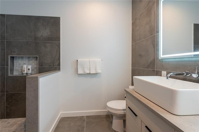 424 S Lopez St, New Orleans, LA 70119 - bathroom featuring tile patterned flooring, vanity, and a walk in shower