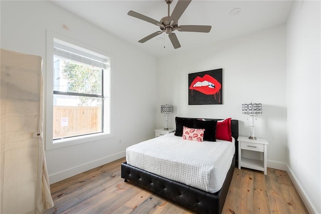 424 S Lopez St, New Orleans, LA 70119 - bedroom featuring wood finished floors and a ceiling fan