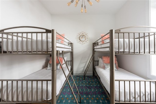 424 S Lopez St, New Orleans, LA 70119 - carpeted bedroom with a chandelier and baseboards
