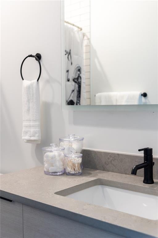 424 S Lopez St, New Orleans, LA 70119 - full bathroom with vanity and a shower with curtain
