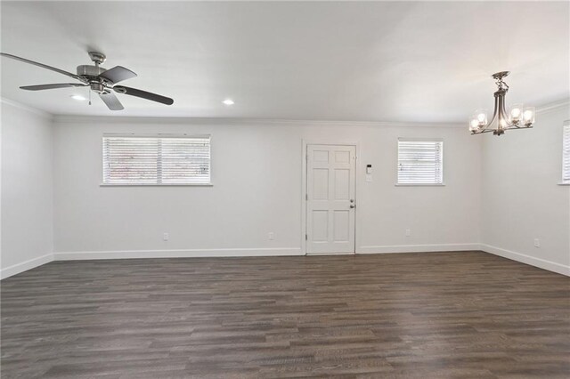 920 Hesper Ave, Metairie, LA 70005 - empty room featuring crown molding, a chandelier, dark wood-style floors, ceiling fan, and recessed lighting
