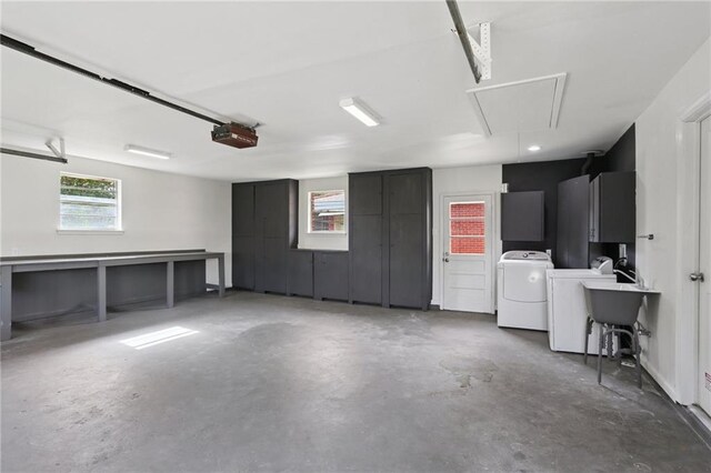 920 Hesper Ave, Metairie, LA 70005 - garage with a garage door opener and washing machine and clothes dryer