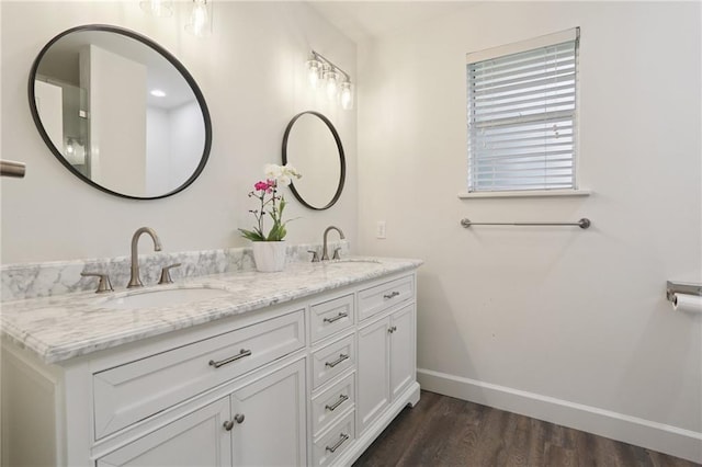 920 Hesper Ave, Metairie, LA 70005 - full bath featuring double vanity and wood finished floors