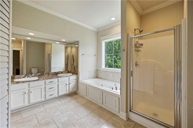 921 Carriage Way, Baton Rouge, LA 70808 - bathroom featuring a tub with jets, double vanity, ornamental molding, a shower stall, and tile patterned flooring