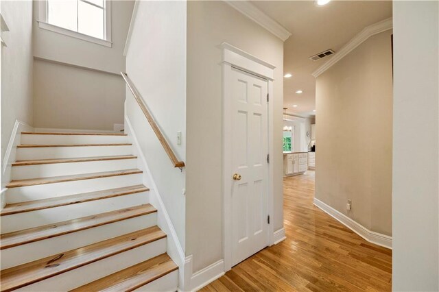 921 Carriage Way, Baton Rouge, LA 70808 - staircase with recessed lighting, ornamental molding, and wood finished floors