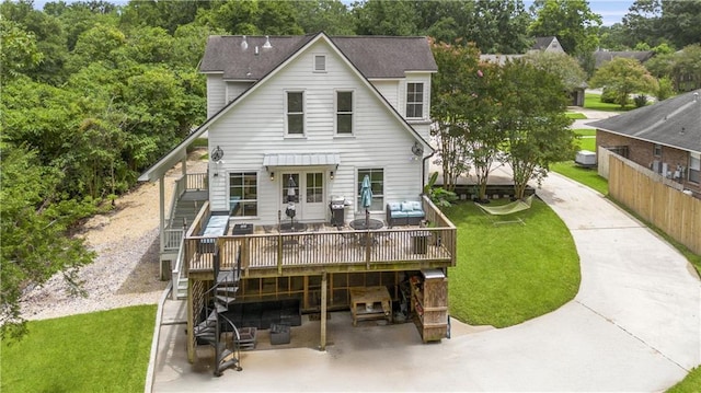 921 Carriage Way, Baton Rouge, LA 70808 - back of property featuring stairs, a deck, a yard, and a patio area